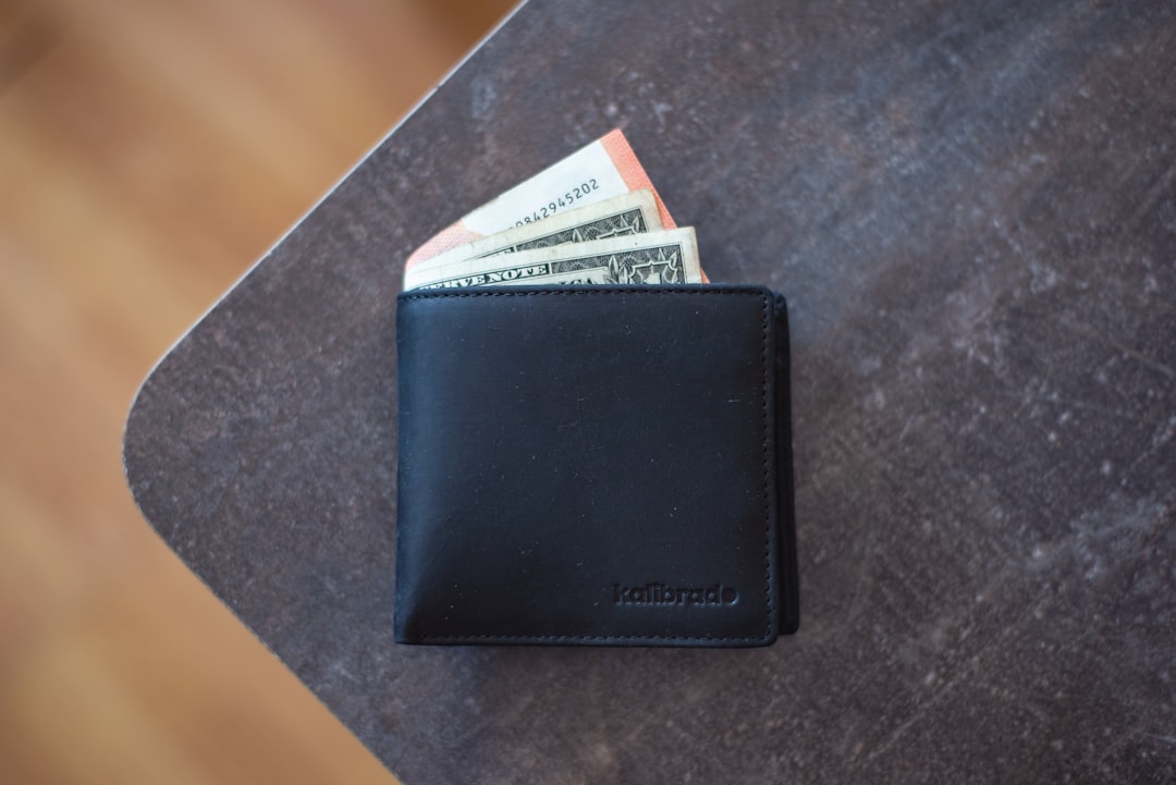 A stack of Kickstarter pledge forms with a red 'money gone' stamp over them
